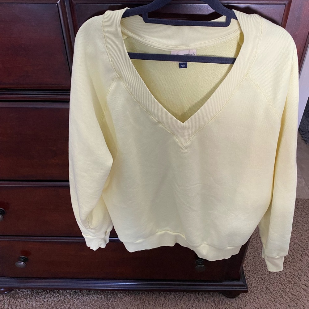 Women’s light yellow sweatshirt size large